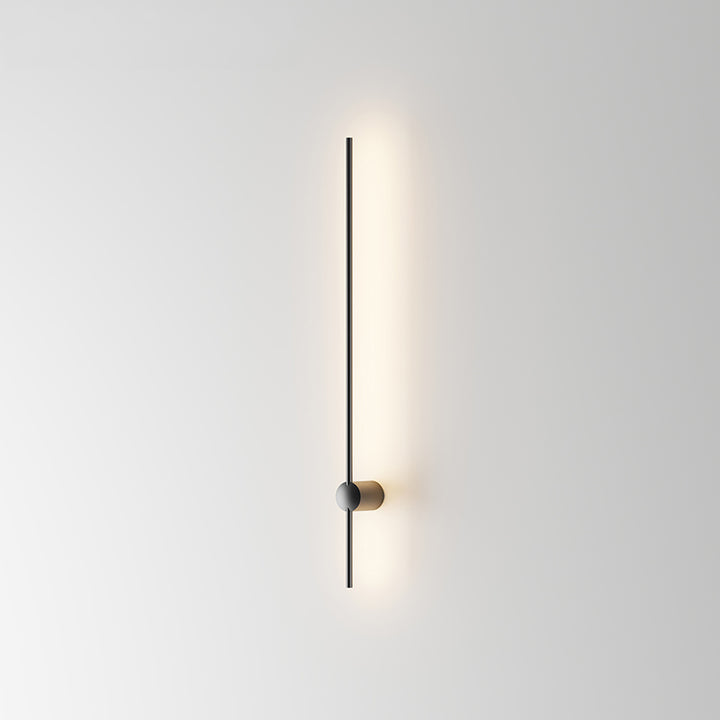 vertical modern LED wall light on a clean white wall offering gentle ambient indoor lighting with a minimalist designer wall lamp style