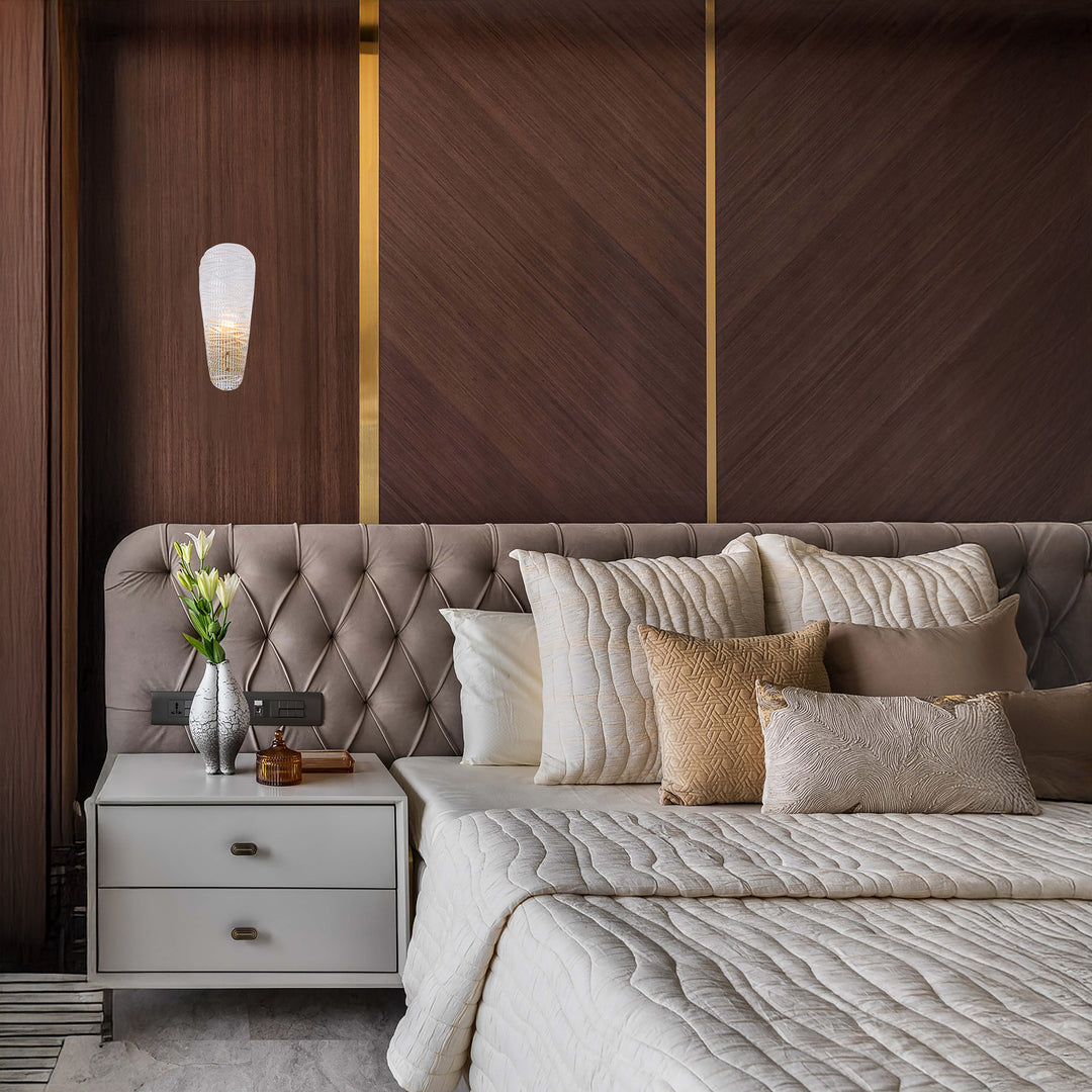 contemporary vetraleaf wall light installed beside bed providing ambient bedroom lighting designer wall lamp for interior spaces