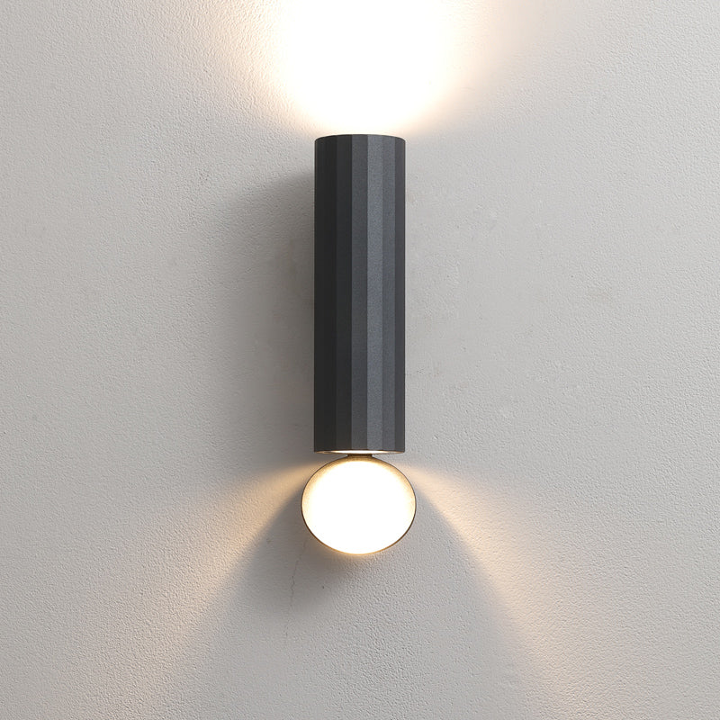 Black W1432 architectural up and down LED wall light providing soft ambient illumination.