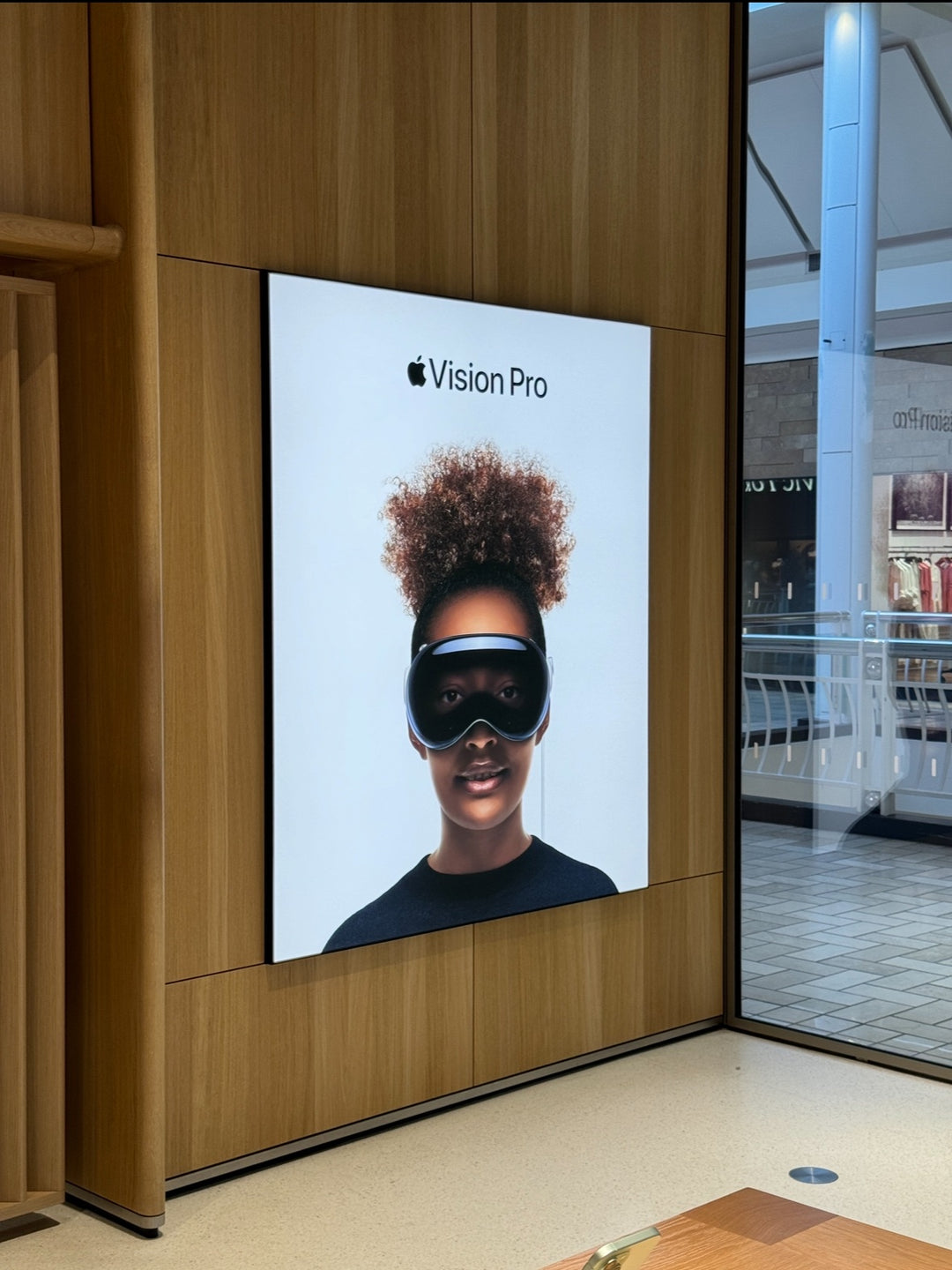 Wall-mounted LED fabric light box showcasing bright backlit visuals for store displays.