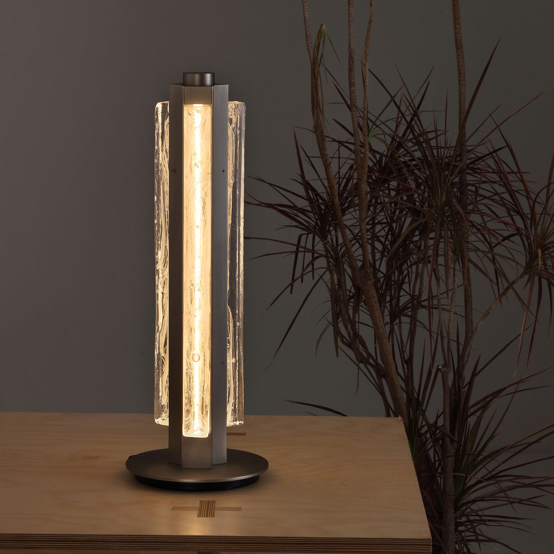 Warm ambient lighting from hand-blown glass table lamp, Running Water Trio designer lamp