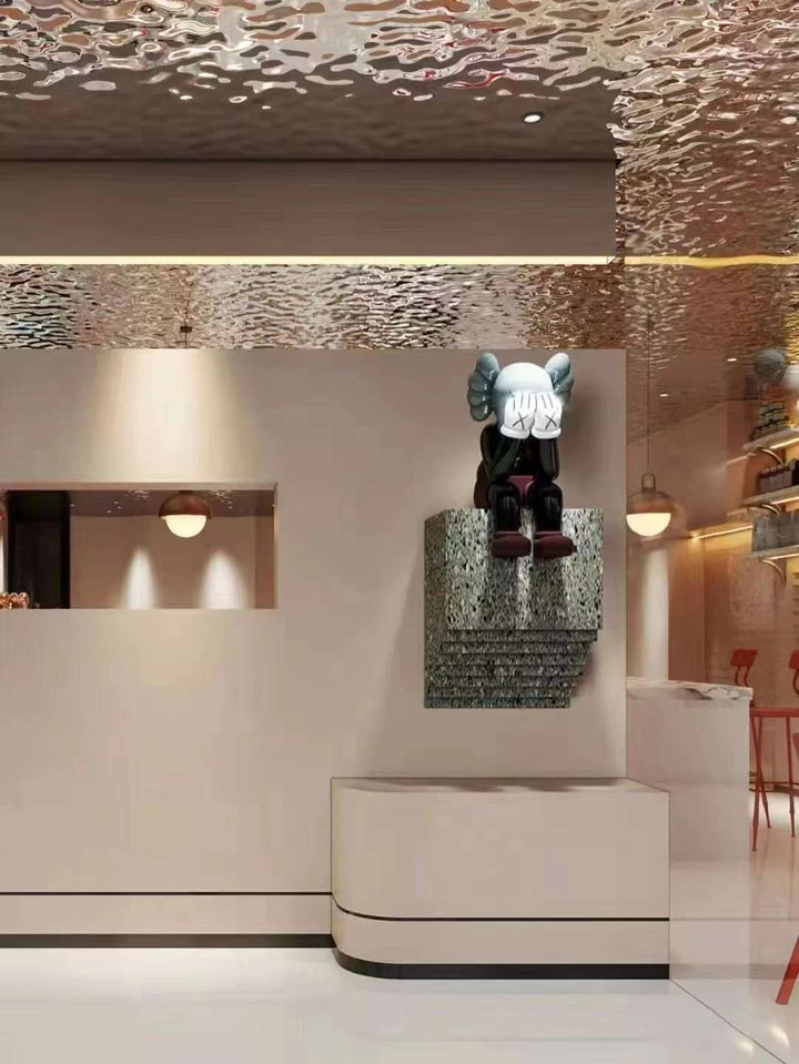 WaveForm 304 stainless steel panel wrapping a structural column with a continuous wave texture