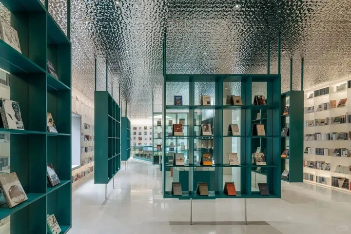 WaveForm 304 stainless steel wall panels used as decorative surfaces in a modern retail interior