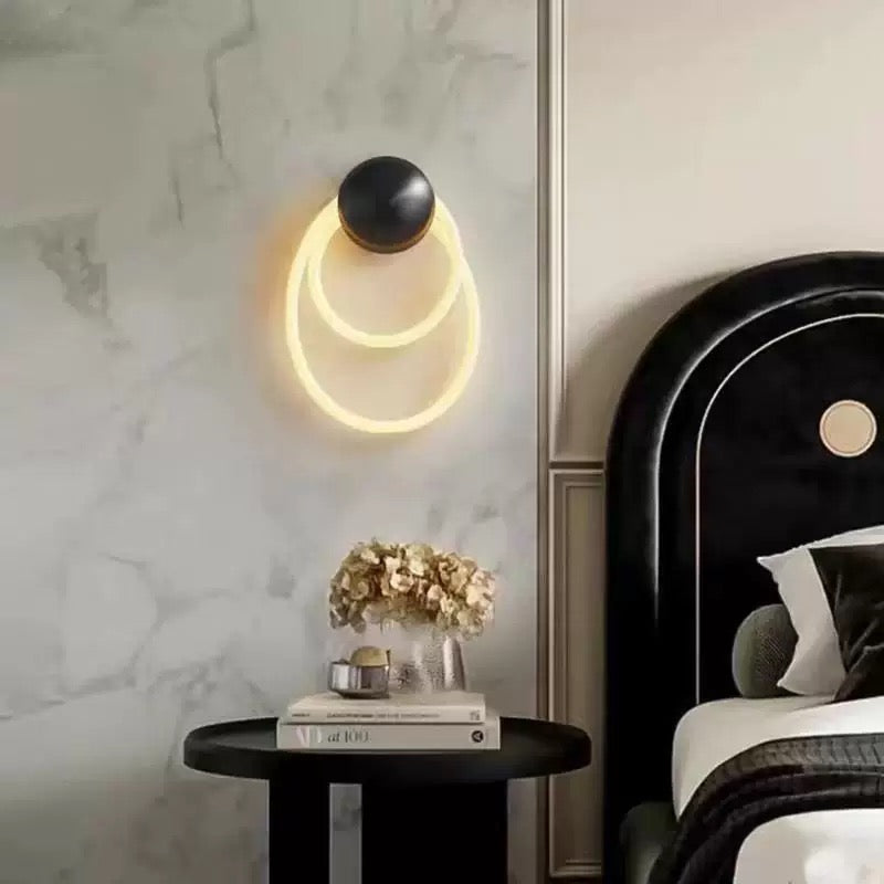 woven neon led wall lamp d providing decorative ambient illumination against a marble feature wall in a modern interior