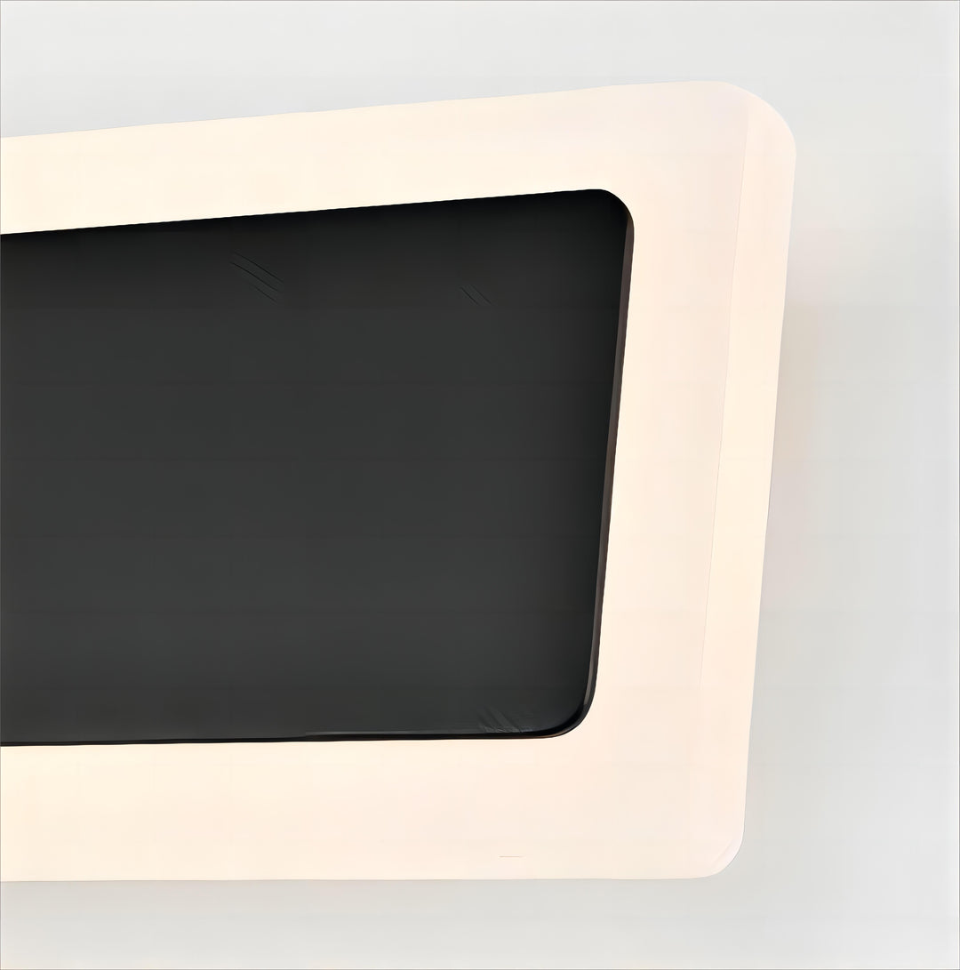Close-up detail of the 069 linear exterior wall light with white frame and recessed LED design.