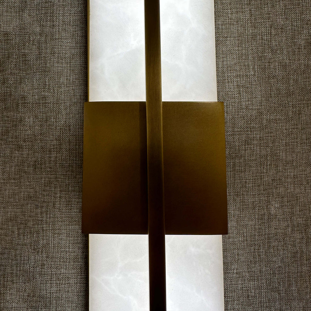 Astor Wall Lamp brass and marble detail shot modern vertical LED wall sconce for contemporary interiors