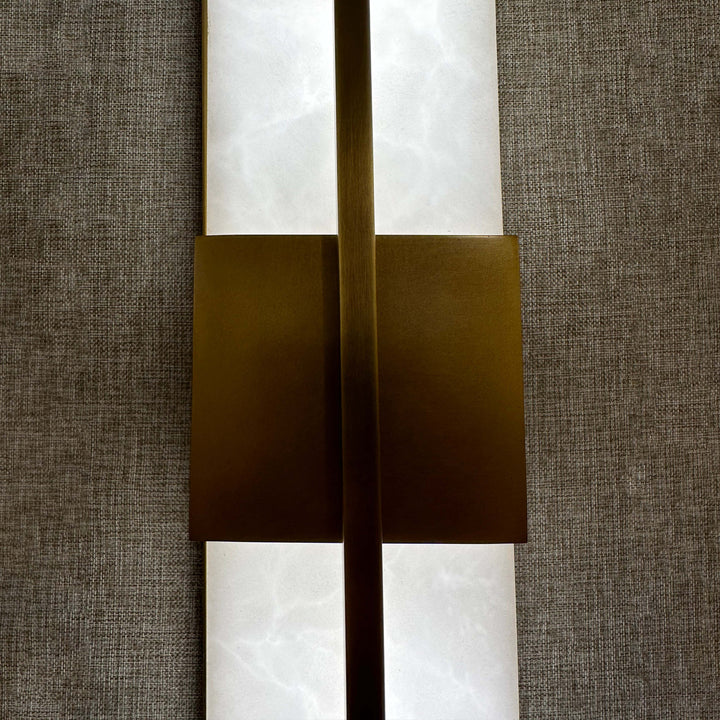Astor Wall Lamp brass and marble detail shot modern vertical LED wall sconce for contemporary interiors