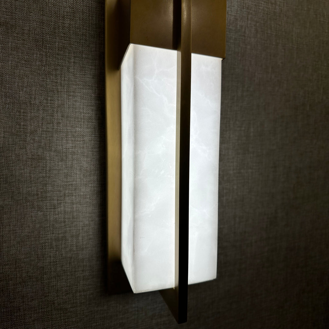 Astor Wall Light marble diffuser with brass frame modern wall lamp side view for interior ambient lighting