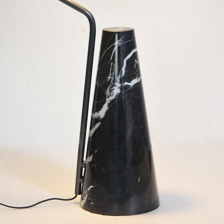 Back view of table lamp with black marble base and sculptural metal arm, perfect for accent lighting in bedrooms and living rooms.