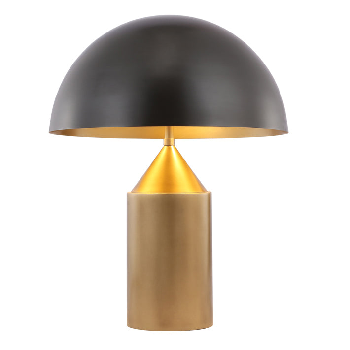 Brass dome table lamp with black metal shade and brushed brass base, offering warm ambient lighting for modern bedrooms and living spaces.