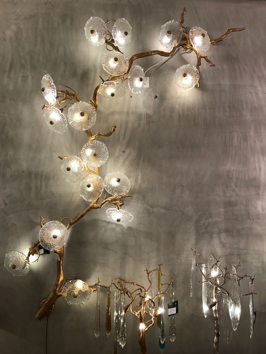 Vertical Desert Rose Brass Wall Light featuring artisan glass globes and warm ambient glow