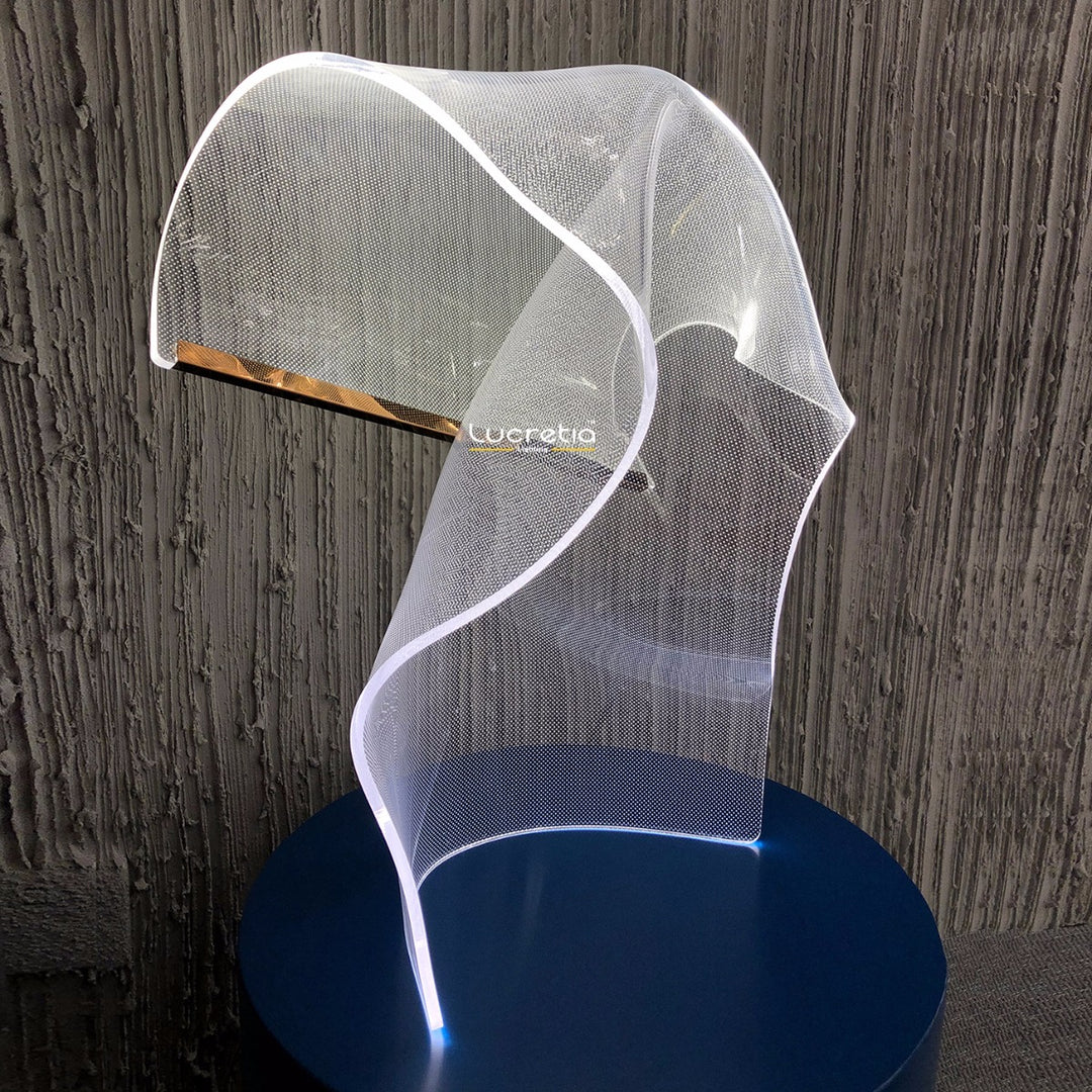 Designer acrylic feature lamp Silken C showing organic sculptural form that scatters light beautifully for stylish living spaces.