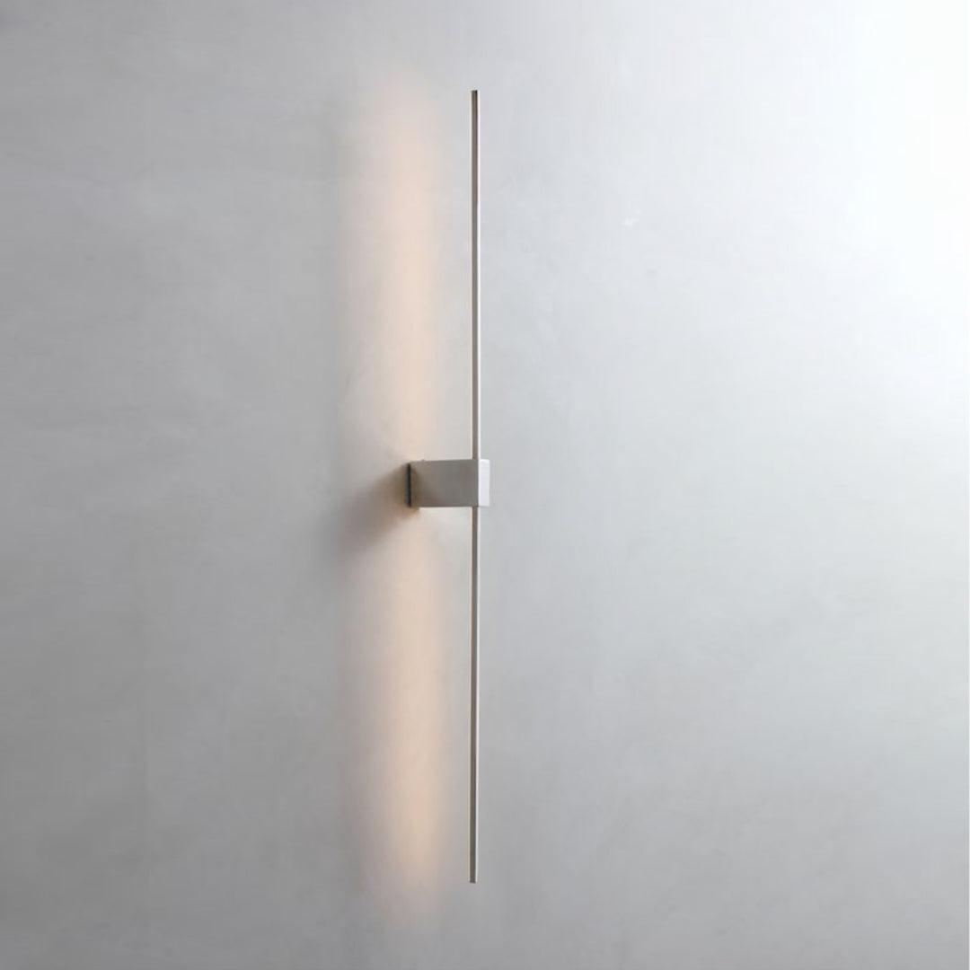 modern vertical linear led wall lamp installed on interior wall providing soft ambient indoor wall lighting ideal for hallways bedrooms living areas and contemporary homes
