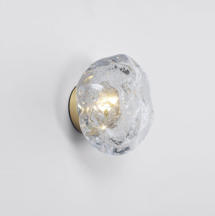 galaxy sculptural glass wall lamp mounted on a white wall providing warm ambient LED wall lighting