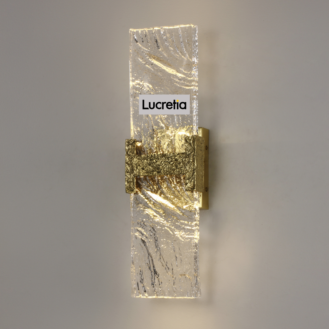 incu wall lamp with hand-carved brass detail and textured illuminated glass panel modern luxury led wall light for hallways bedrooms and boutique interiors