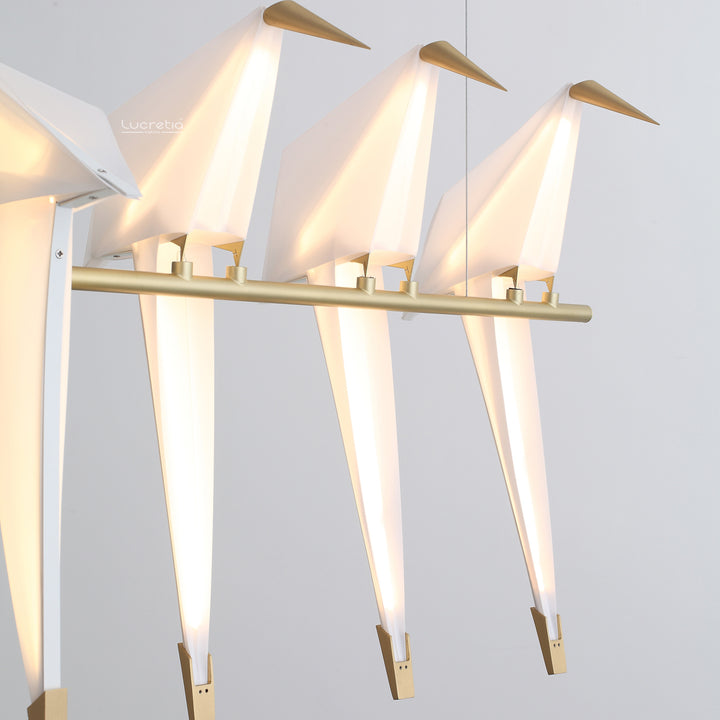 Birdcage Pendant Light 5 by Lucretia Lighting displayed in a modern interior with linear brass bird arrangement