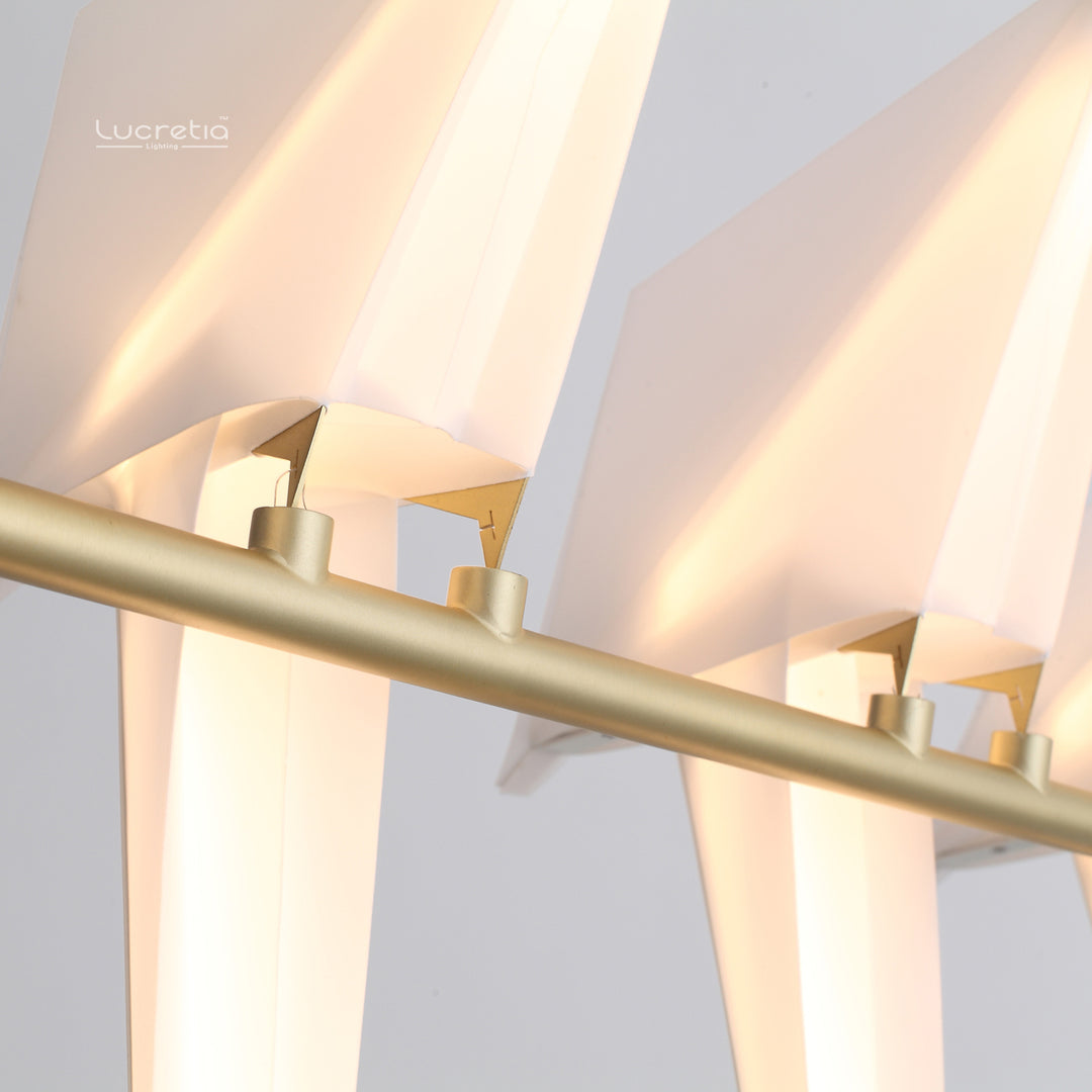 Birdcage Pendant Light 5 by Lucretia Lighting highlighting folded brass bird details and warm LED glow