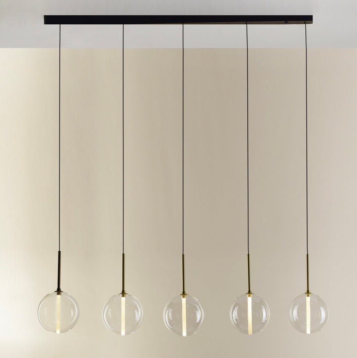 Bolle 5B Pendant Light by Lucretia Lighting featuring five suspended glass spheres on a linear canopy for modern interiors