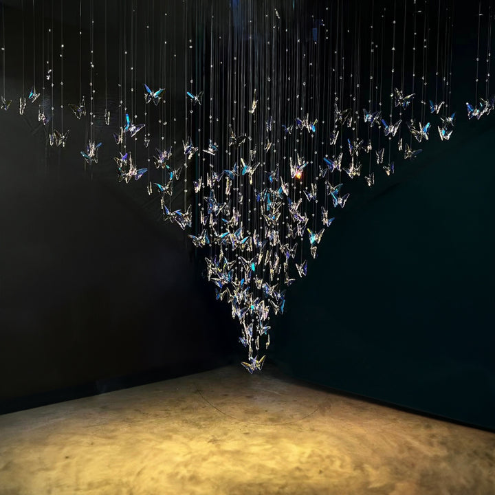 Lucretia Lighting butterflies custom pendant shown as a bespoke crystal sculptural lighting installation in a modern architectural interior