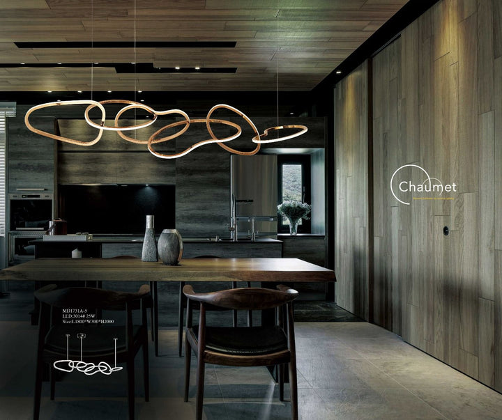 Lucretia Lighting Ceaseless designer linear pendant installed above modern kitchen island as a luxury feature light