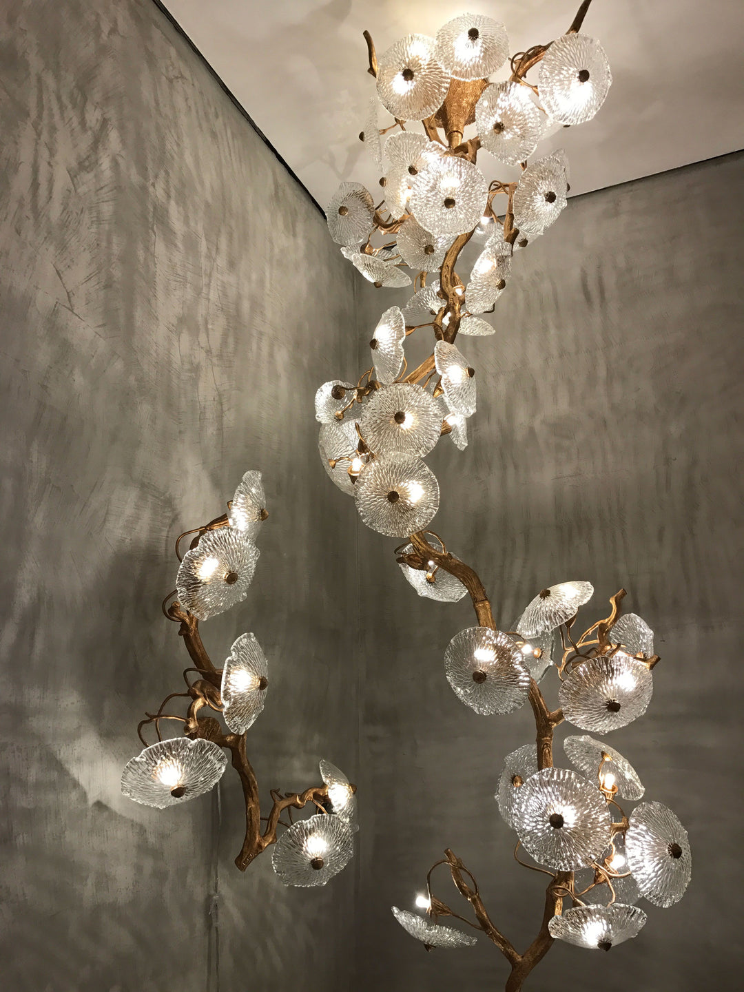 Lucretia Lighting Desert Rose organic glass flower chandelier, luxury ceiling light ideal for high-ceiling interiors, stair voids and contemporary statement lighting