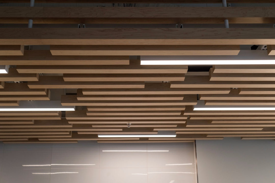 Endless 6588 LED linear lights integrated into wood ceiling feature providing seamless architectural lighting for commercial interiors
