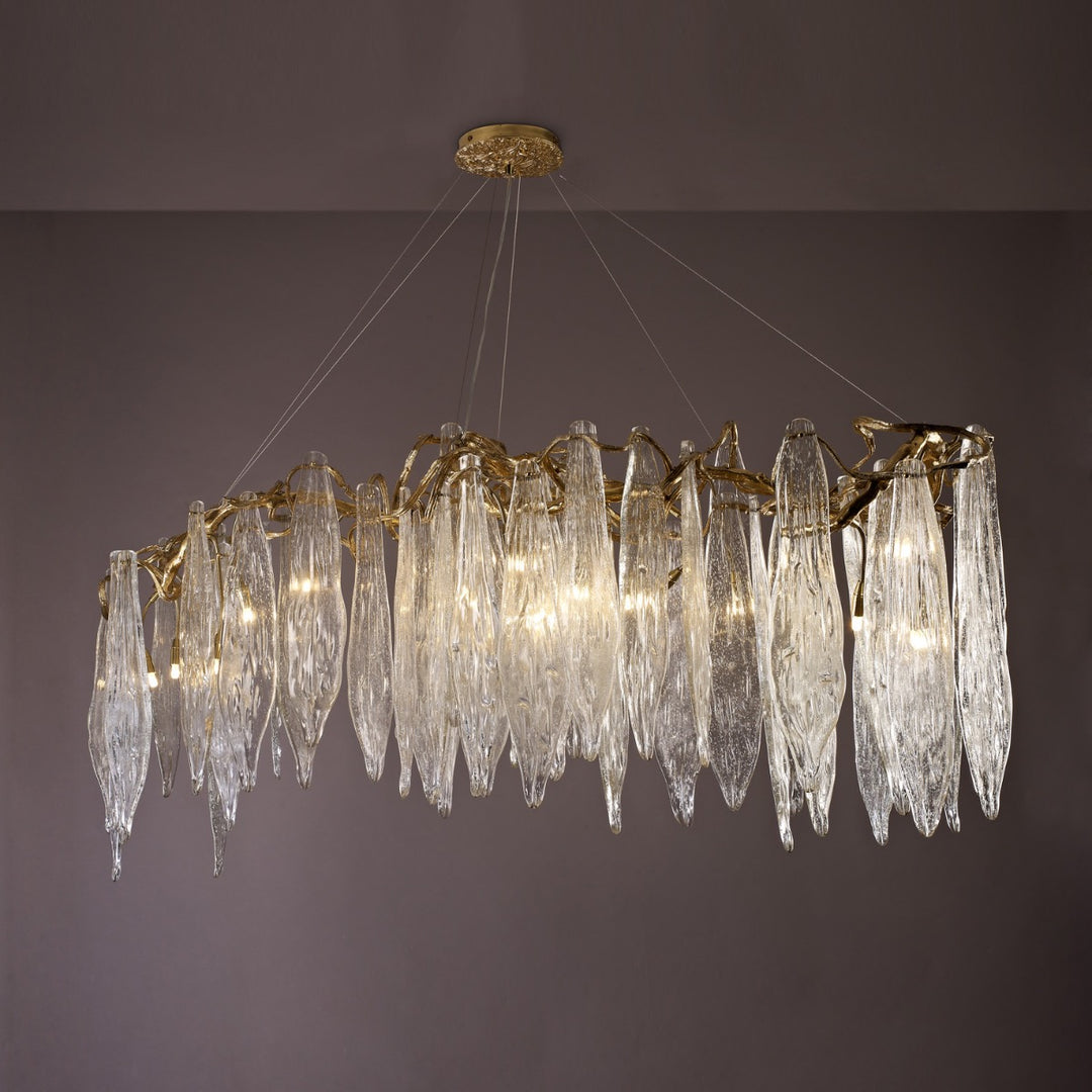 Glacier Brass Oval Chandelier by Lucretia Lighting featuring glass icicles and brass frame in luxury designer style