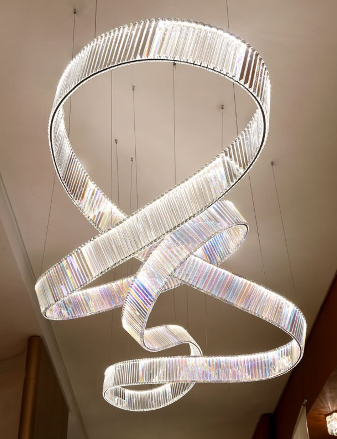 Lucretia Lighting Infinity 3800 custom crystal sculptural pendant light displayed in a bespoke installation setting