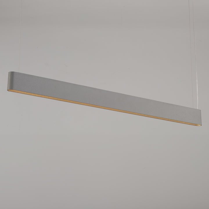 modern grey Ova Linear Pendant Light by Lucretia Lighting suspended above interior spaces with clean architectural lines