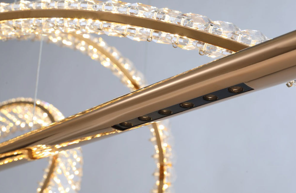 Close-up of the Pharaoh Knot Pendant Light showcasing crystal detailing and electroplated metal finish by Lucretia Lighting