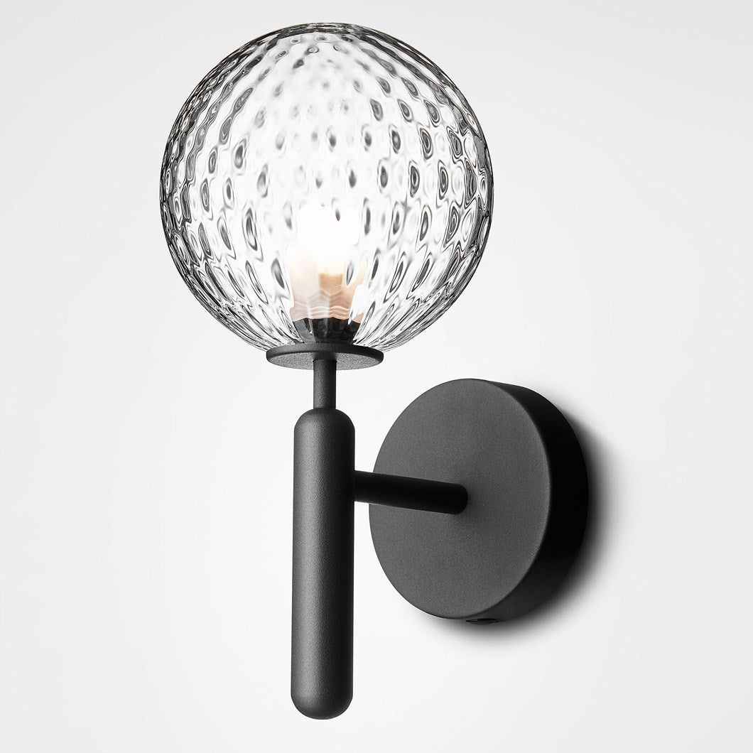rippled glass modern wall lamp with black metal base ideal for bedside wall light hallway wall lighting and contemporary indoor ambient illumination
