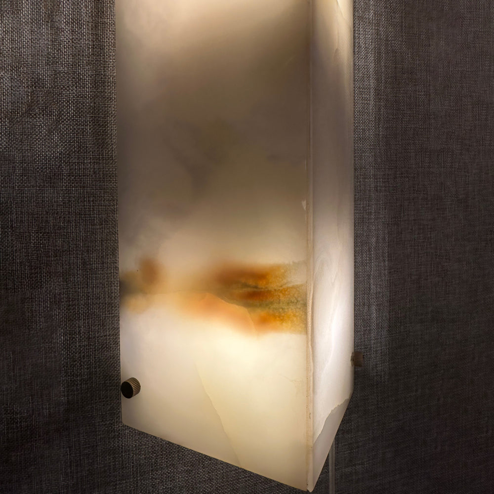 Side view of Manhattan Jade Wall Lamp alabaster wall sconce with warm LED glow for modern interiors