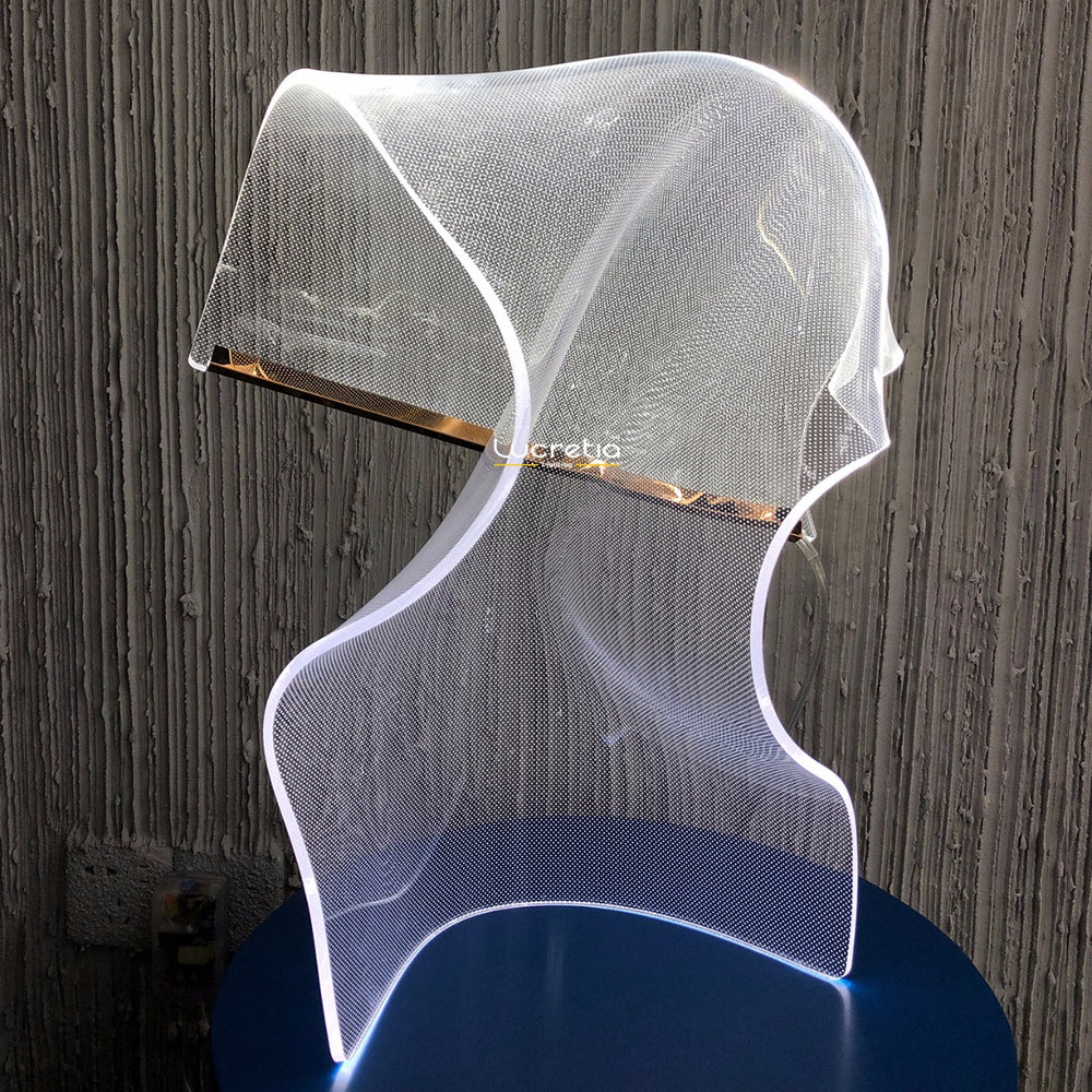 Modern acrylic table lamp Silken C with fluid contours and atmospheric soft lighting ideal for bedside tables, consoles and contemporary décor.