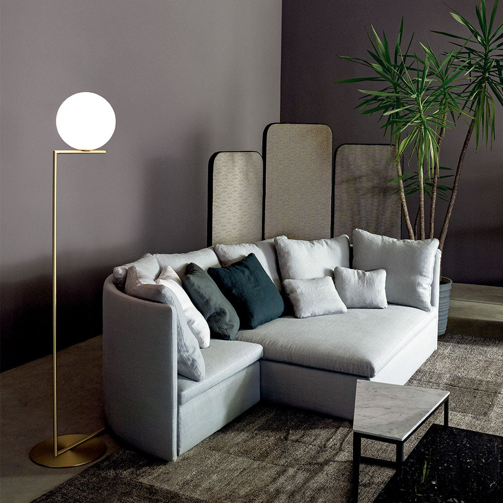 Opal Glass Floor Lamp providing warm diffused ambient lighting in modern living room
