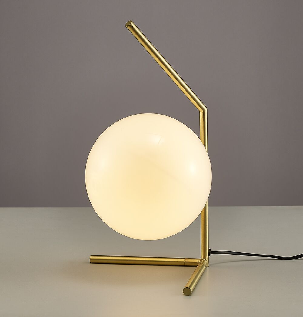 Opal glass low table lamp with gold metal frame and spherical globe, ideal for modern bedside lighting, living rooms and contemporary Australian interiors.