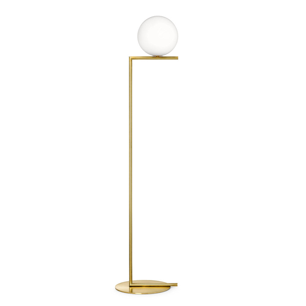 Designer opal globe floor lamp with slim gold frame in minimalist interior
