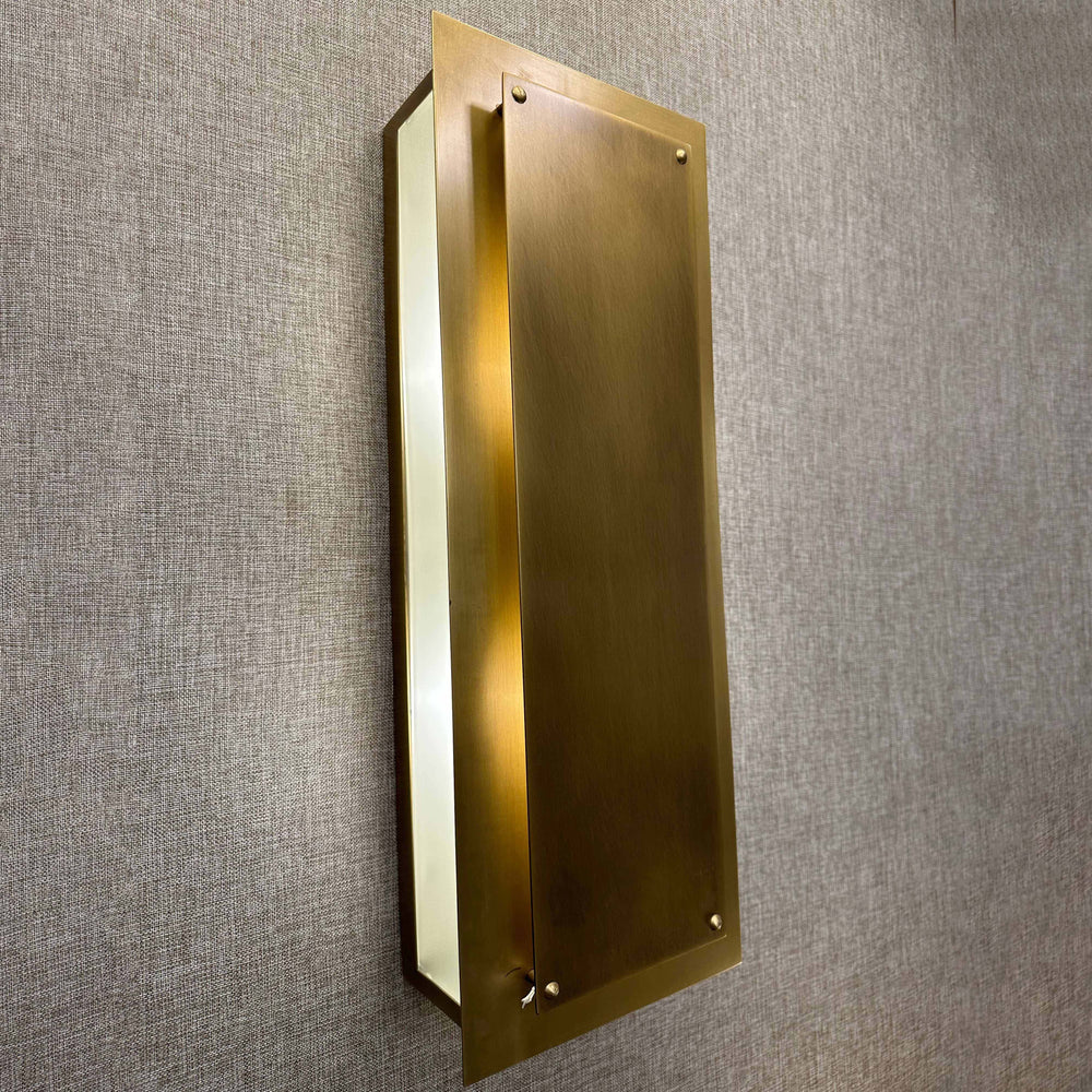 Side view of Regis Wall Lamp brushed brass slim rectangular modern Art Deco wall light for interior spaces
