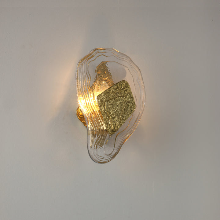reliquia brass and crystal designer wall lamp providing warm ambient led wall lighting in a modern interior