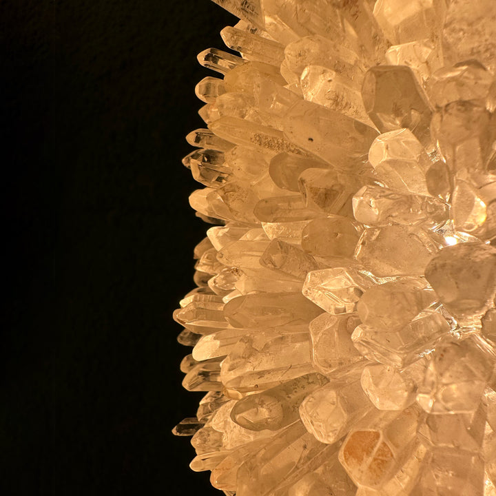 Sculptural Floco de Neve crystal wall lamp on dark background, contemporary decorative wall light for stylish interior lighting