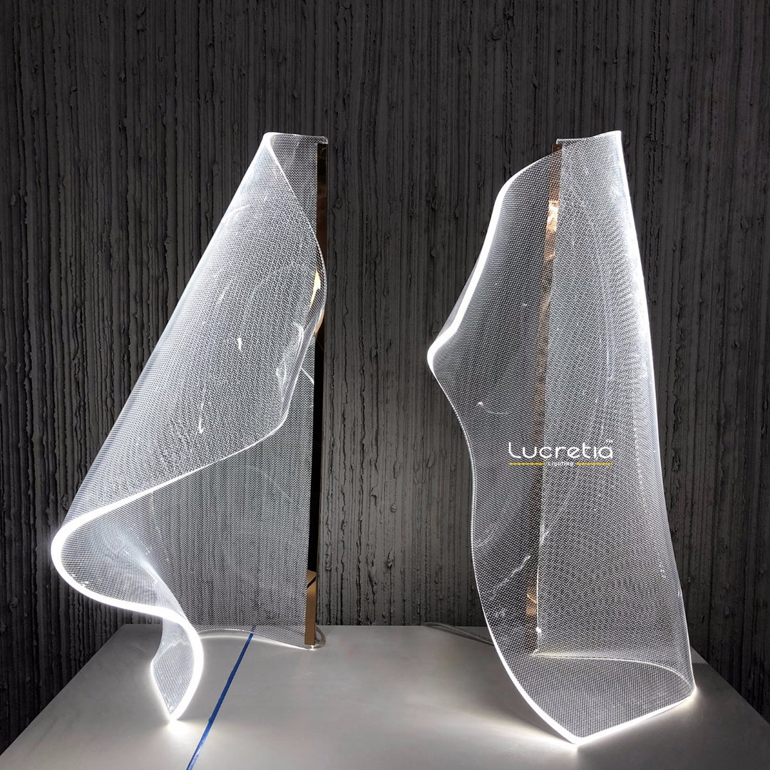 Sculptural LED Silken A table lamp displayed in paired arrangement, offering artistic ambient lighting for contemporary interior spaces.