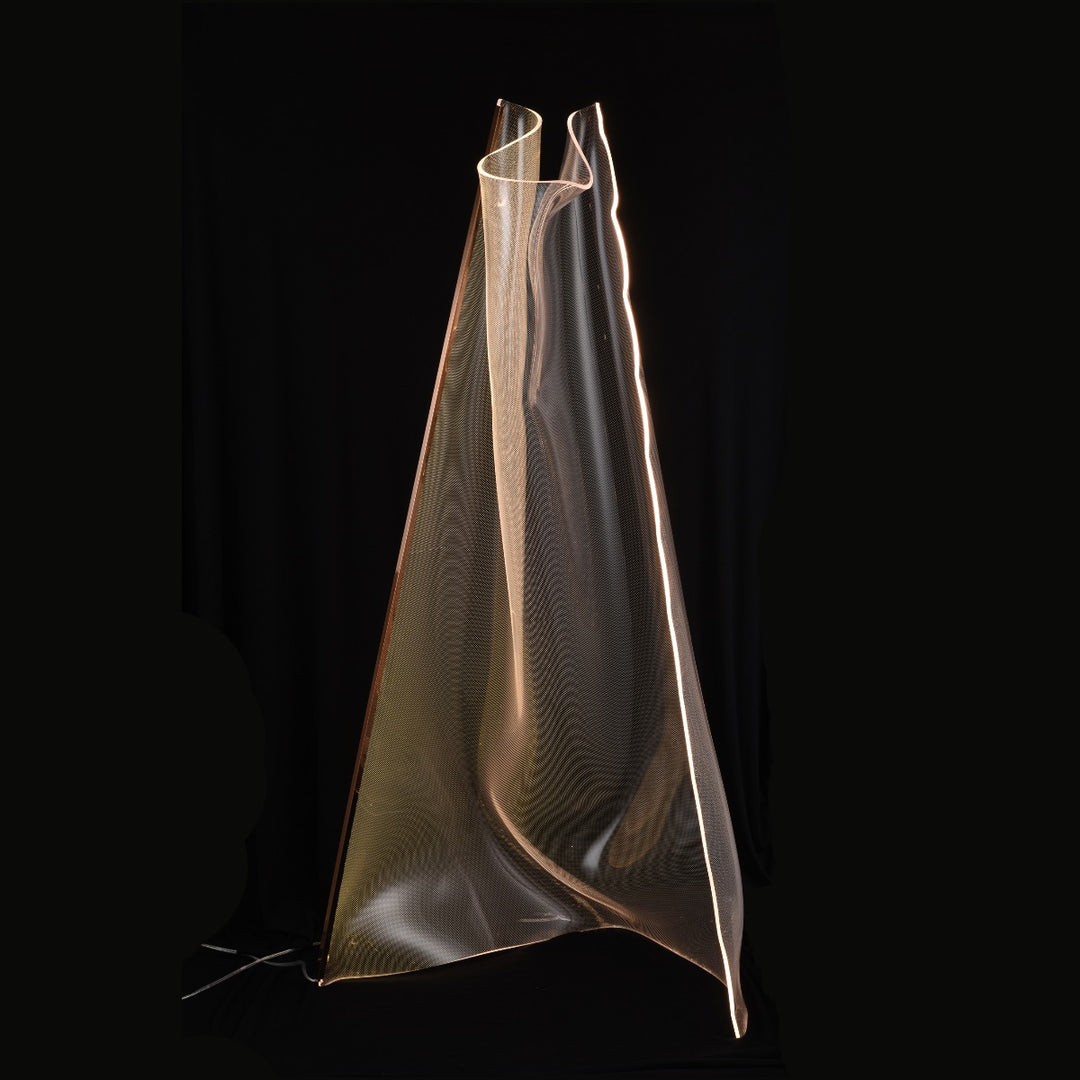 Silken Floor Lamp made from illuminated folded acrylic creating a sculptural glowing form.