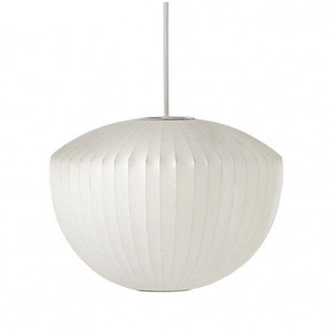 a soft diffused pendant light producing an even ambient glow with a calm visual presence