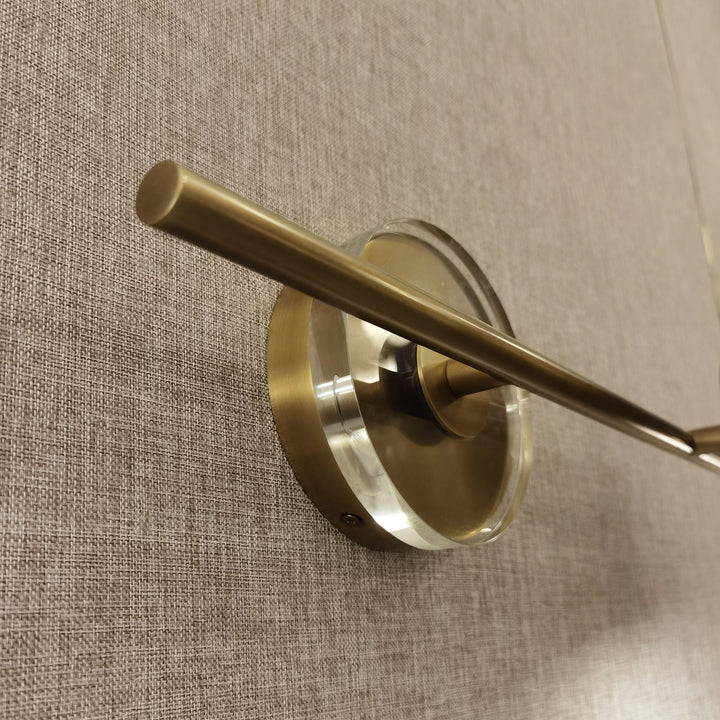 horizontal brass modern wall lamp mounted on interior wall providing focused ambient lighting suitable for study rooms hallways and contemporary spaces